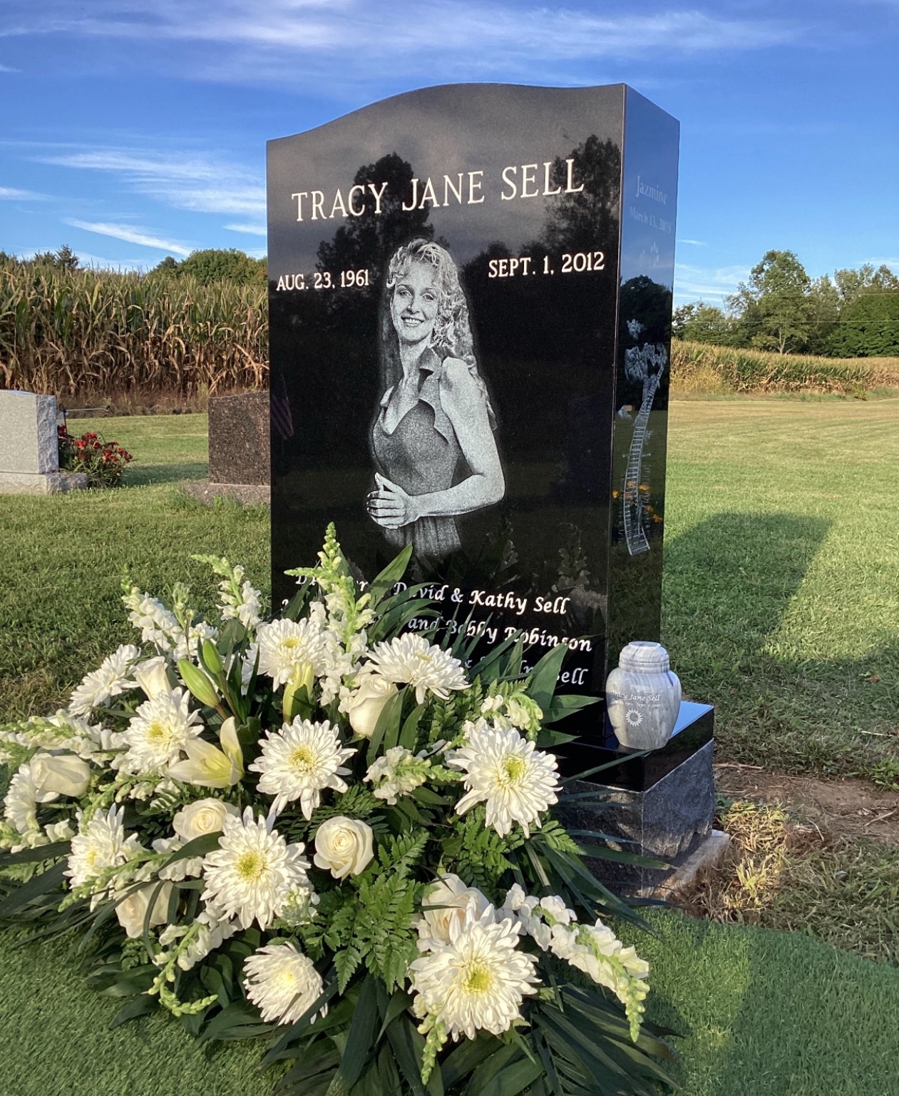 Original photograph of Tracy Jane Sell's black granite upright memorial